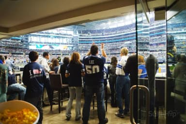 Field Suite patio with barstool seating right on the field.