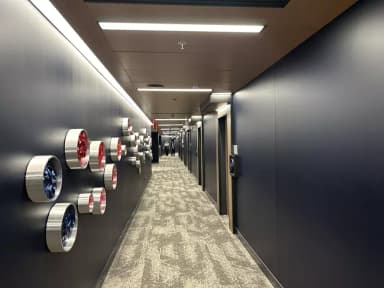 Suite level hallway with access to exclusive restrooms and entrance to your suite.